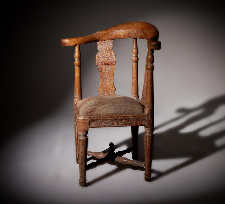 A late 18th century "wig" chair