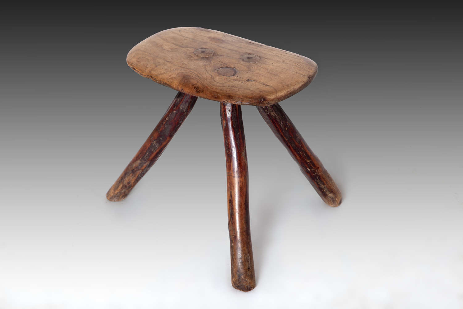 A small 19th century fruitwood stool