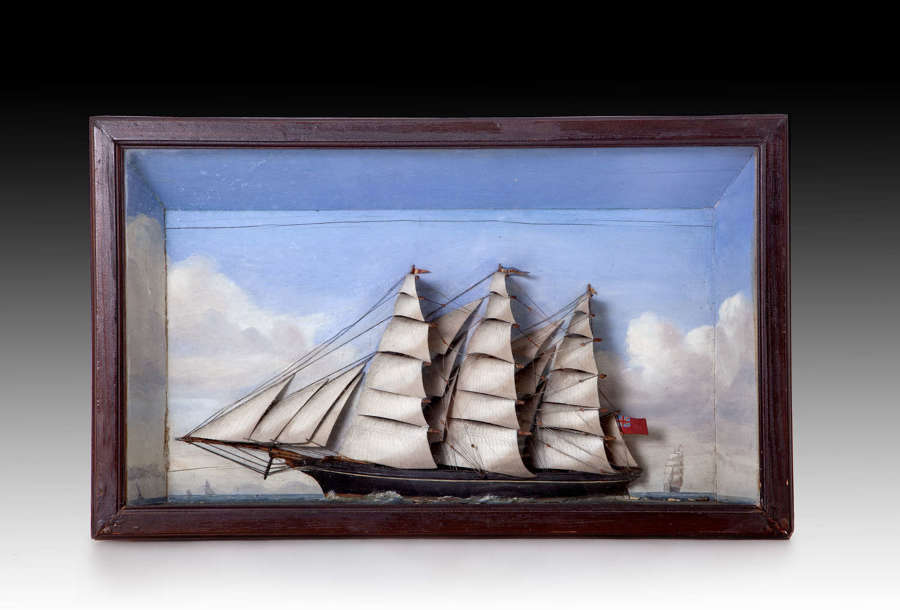 A 19th century diorama of a clipper in a stiff breeze