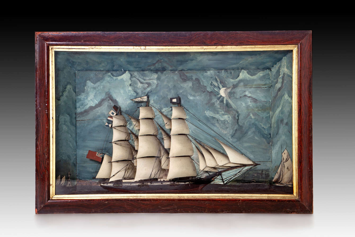A magnificent diorama of a ship in stormy seas