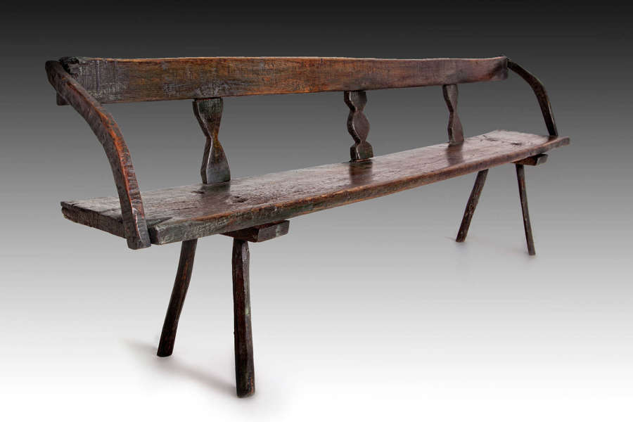 A 19th century Continental rustic bench