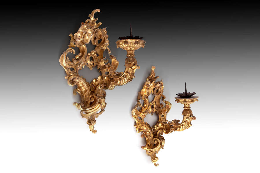 A pair of late 17th century giltwood wall lights