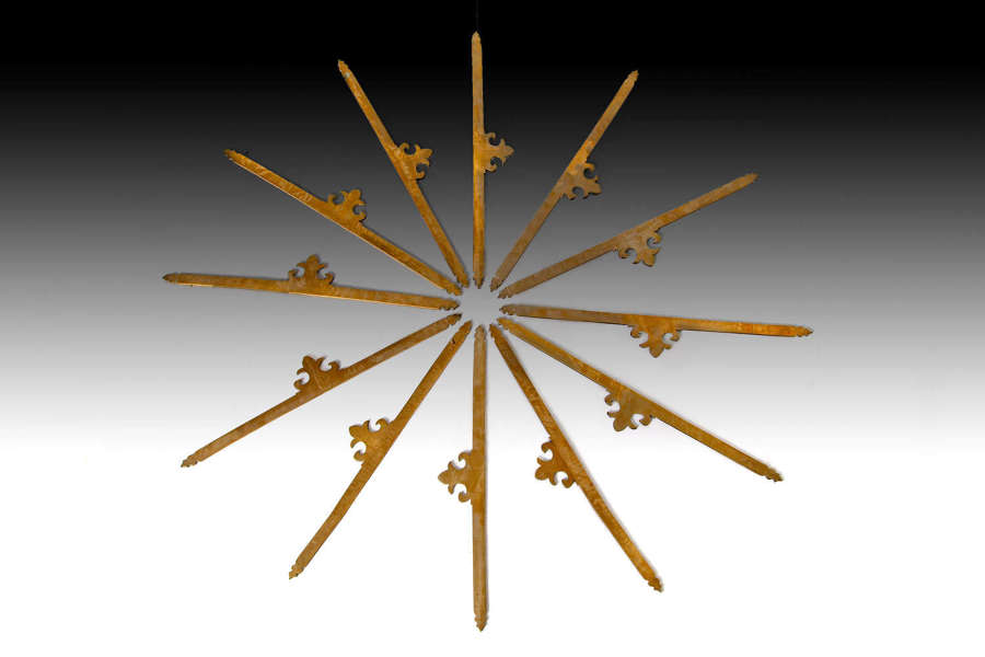 A set of 12 brass stair rods