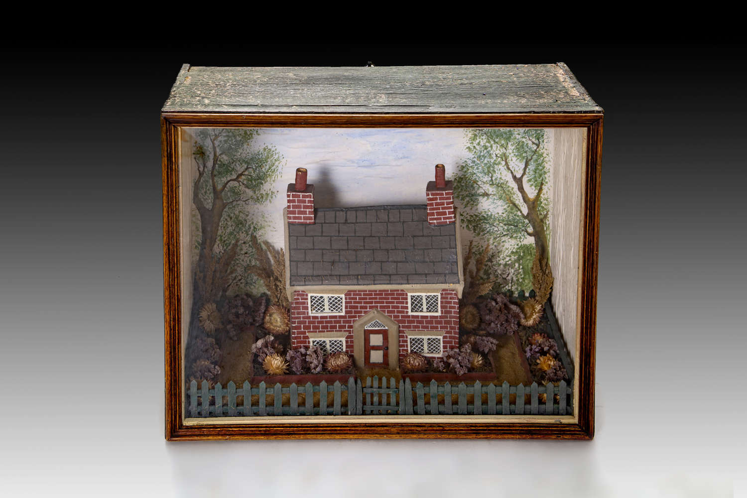 A delightful 19th century diorama of a country cottage
