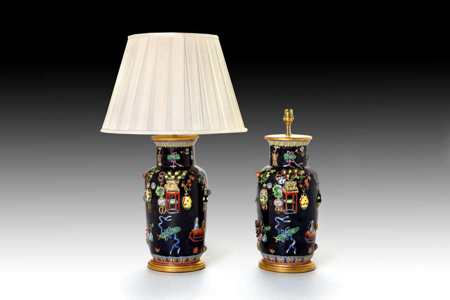 A superb pair of Famille Noir vases