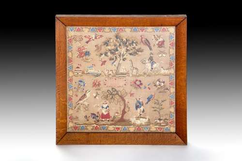 A  large 19th century needlework spot sampler