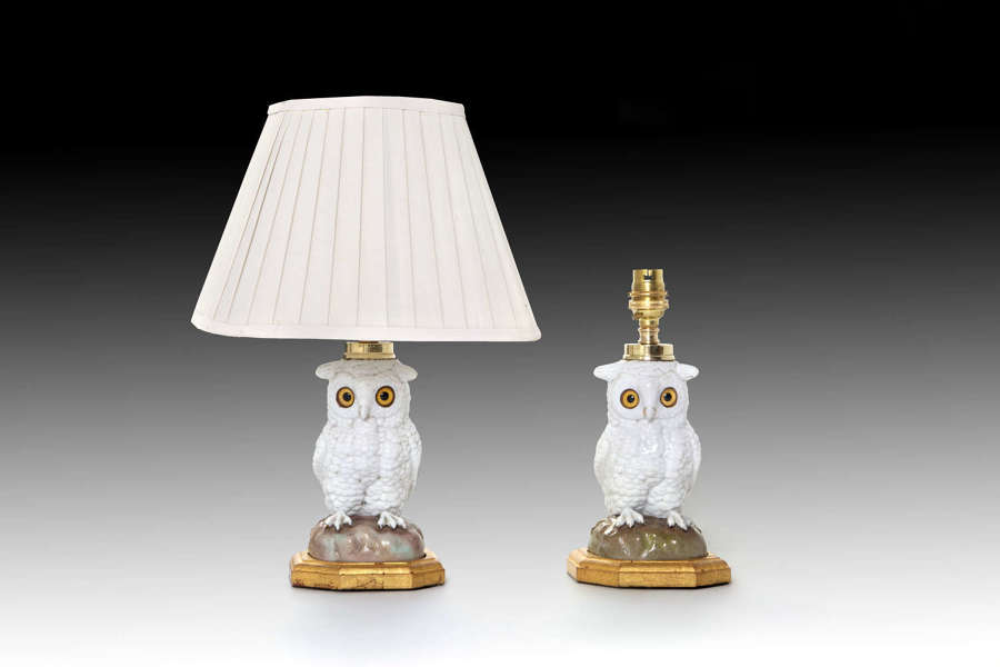 A pair of porcelain owl table lamps