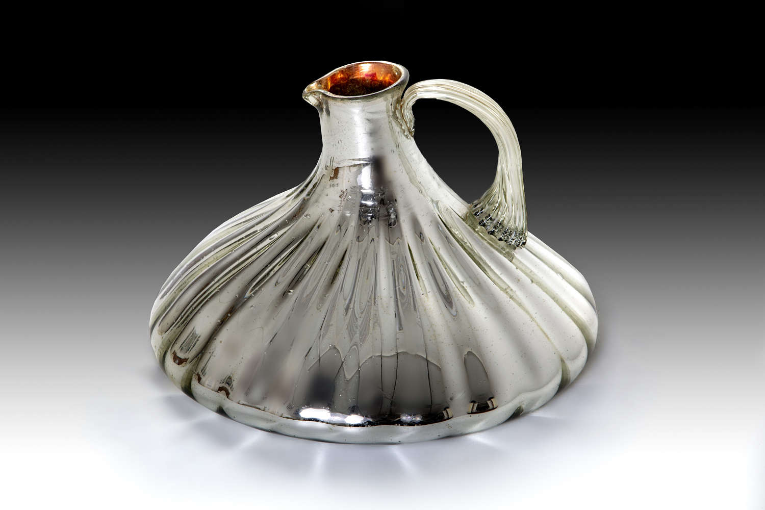 A rare early 20th century glass carafe
