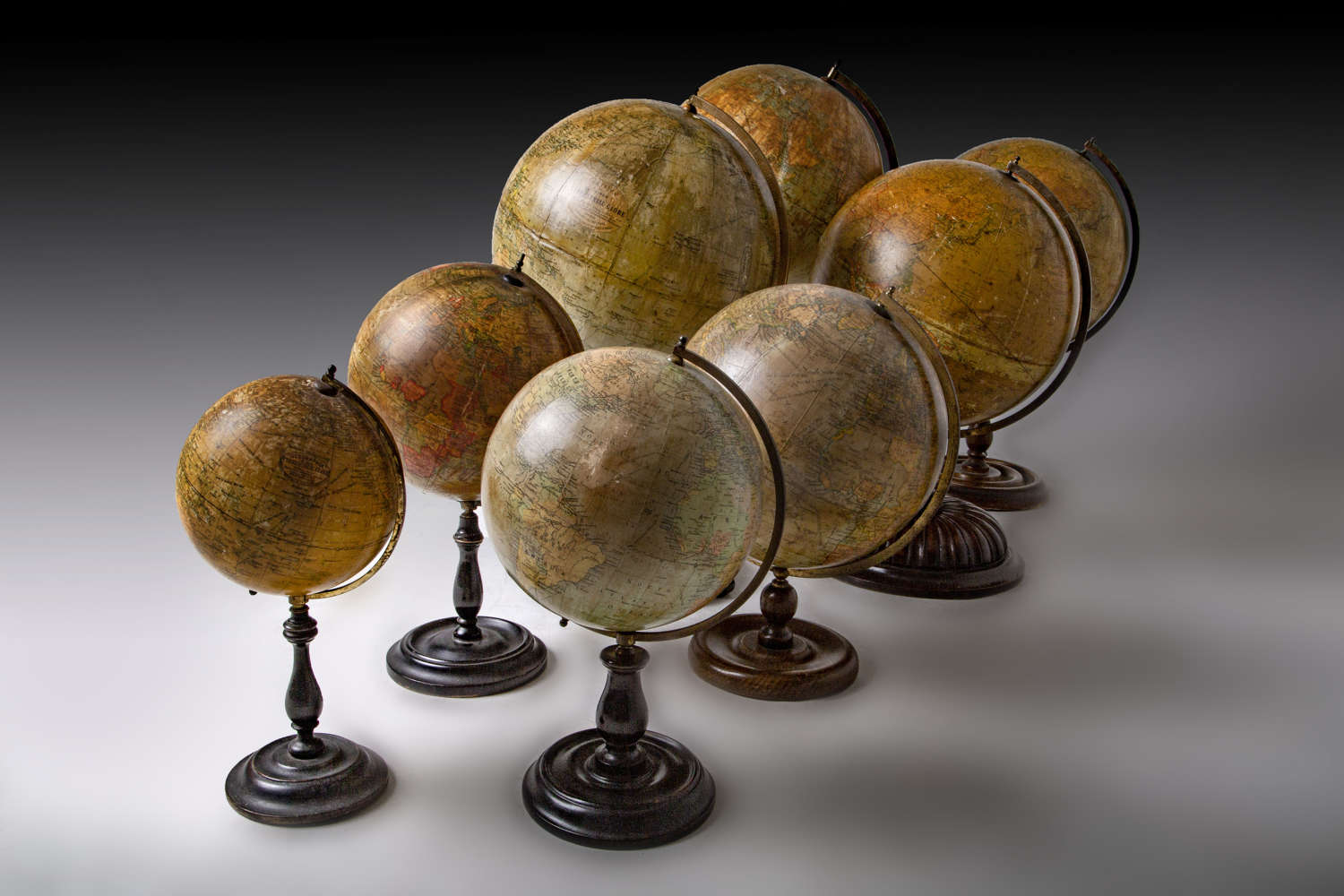 A lovely group of four 19th century table globes