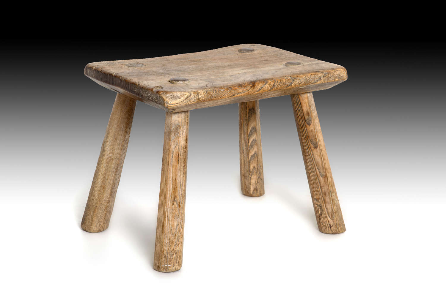 A solid Ash fireside stool