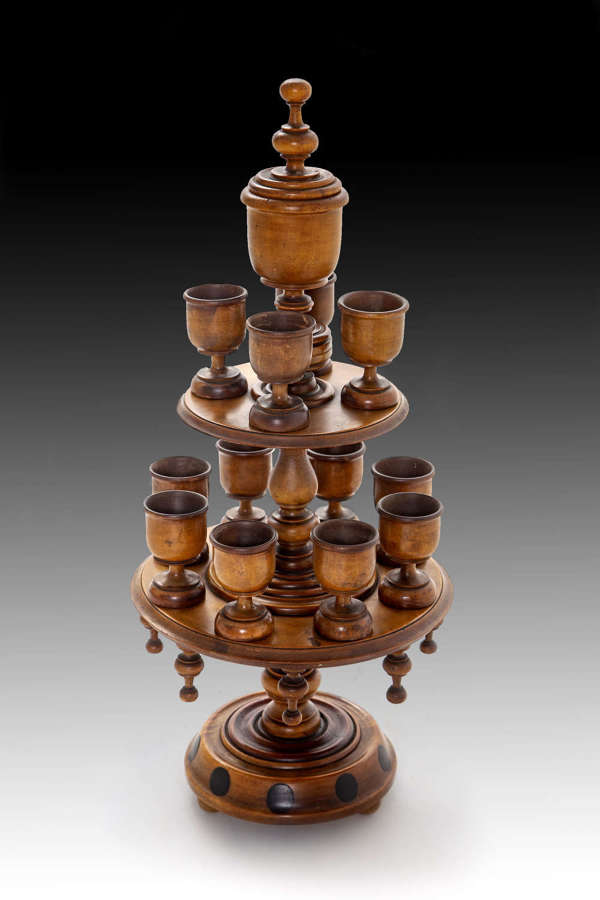 A 19th century satinwood egg stand