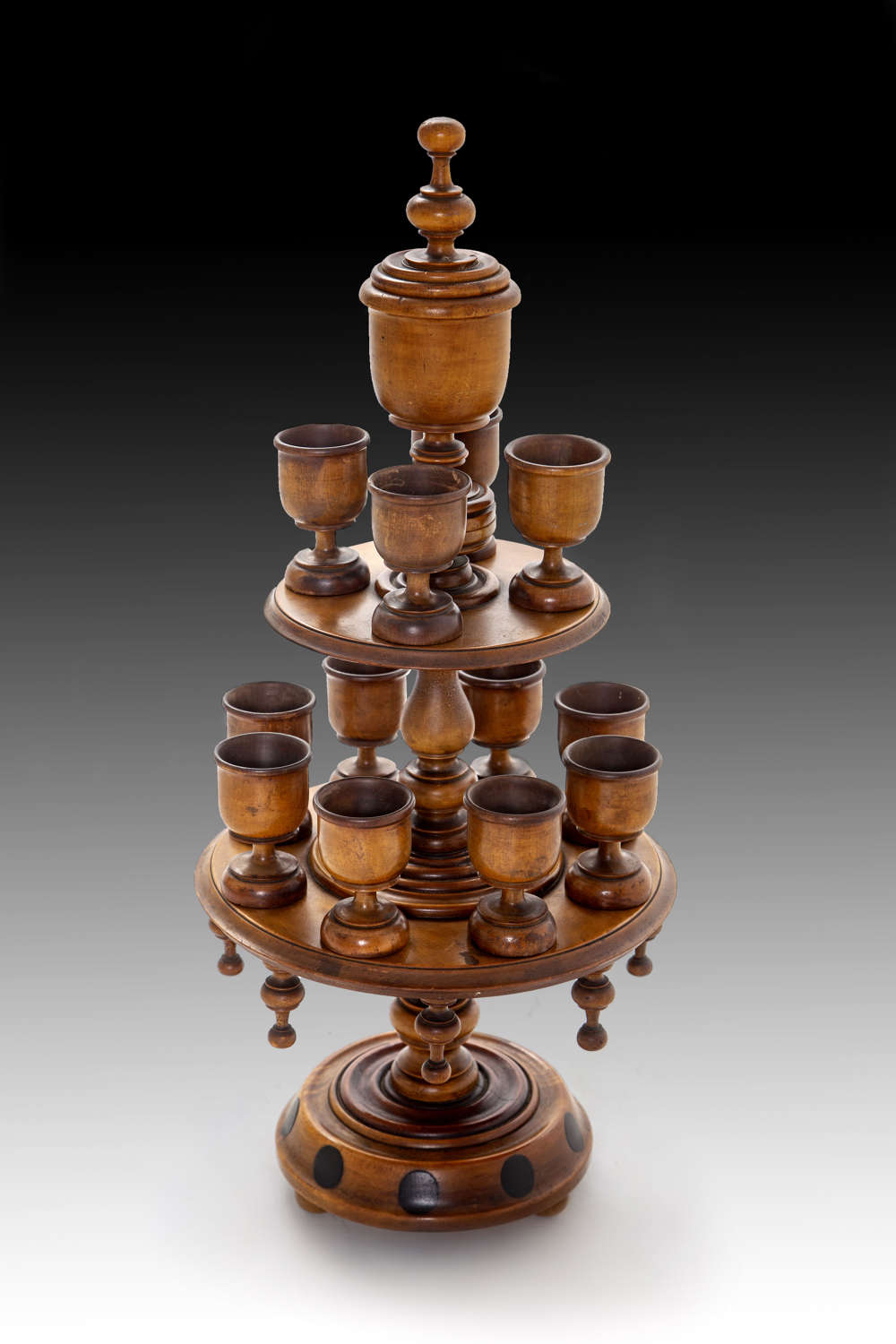 A 19th century satinwood egg stand
