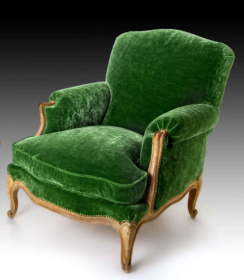 A pair of Louis XV style armchairs