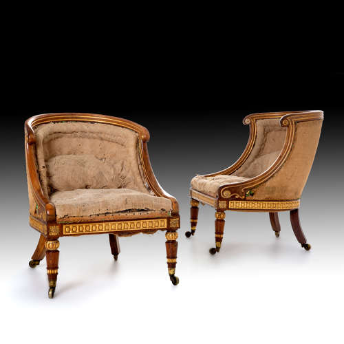 Two exceptional sleigh back armchairs