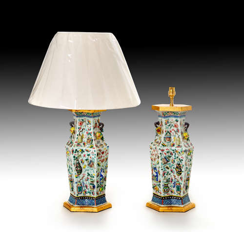 A pair of early 19th century famille rose vases as lamps