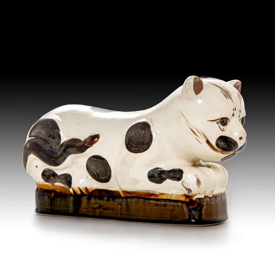 A 19th century pottery cat
