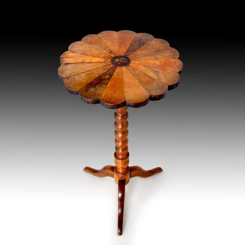 A charming early 19th century fruitwood table