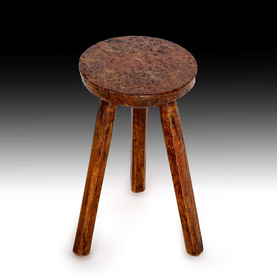 An early 19th century yew wood hearth table