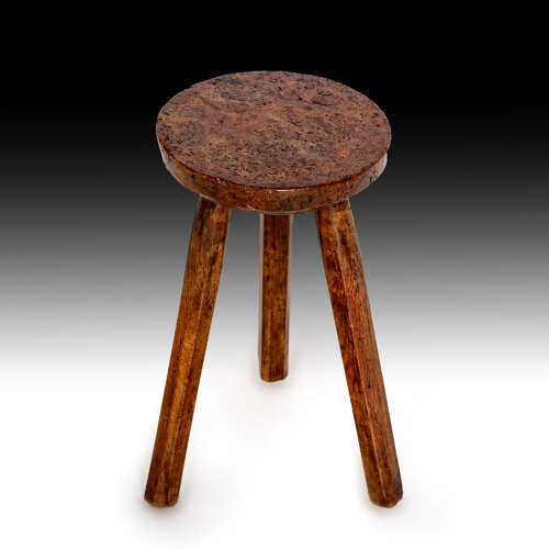 An early 19th century yew wood hearth table