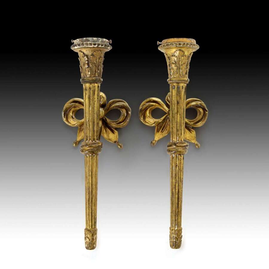 A pair of "Roman" style classical torchere