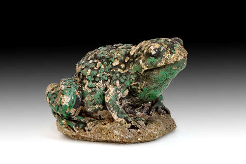 A cast stone toad
