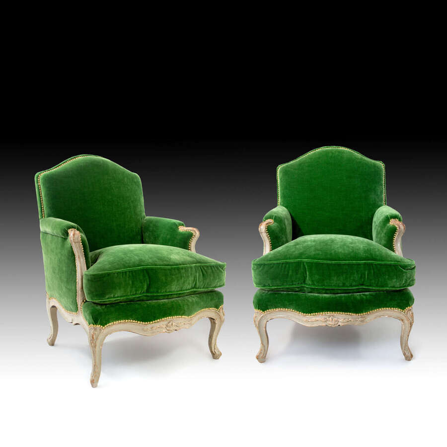 A pair of Louis XV bergere armchairs