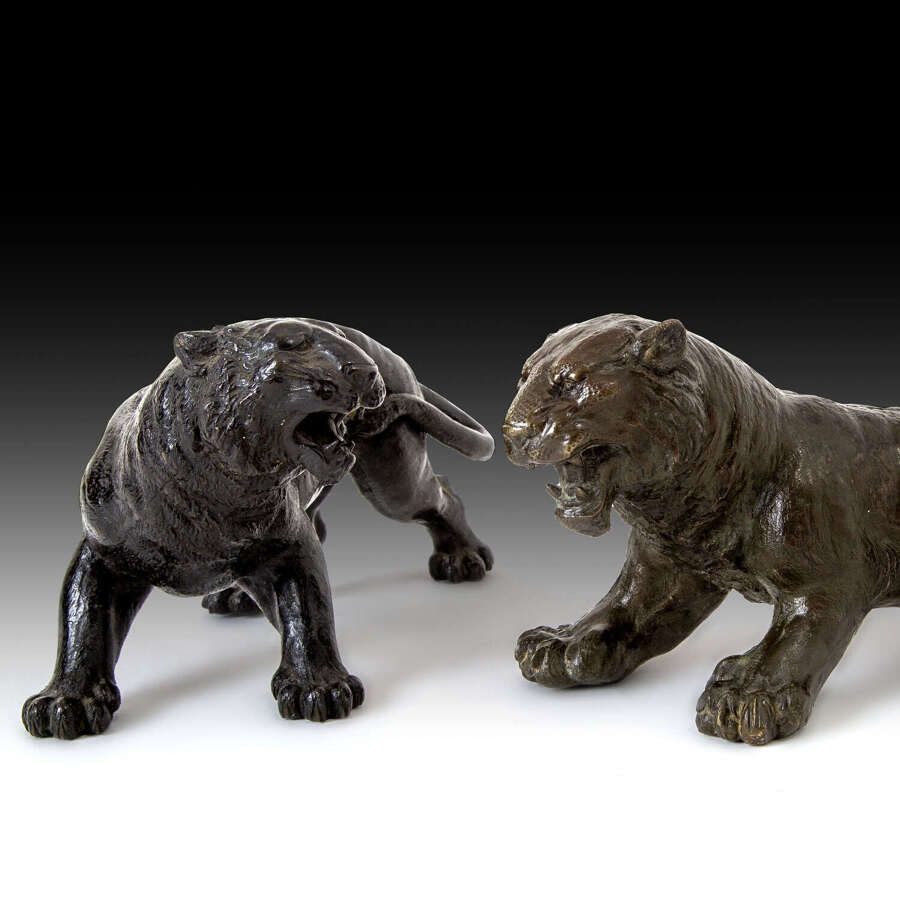 Two early 20th century bronze tigers