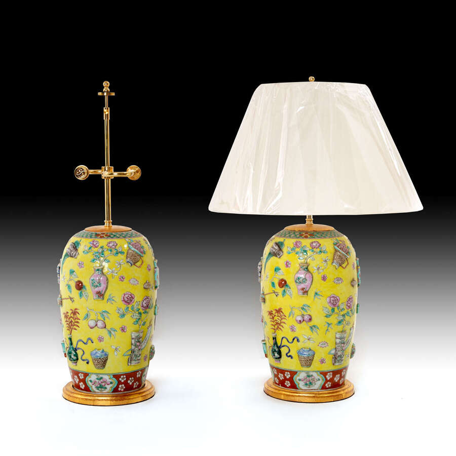 A pair of early 19th century yellow ground vases as lamps