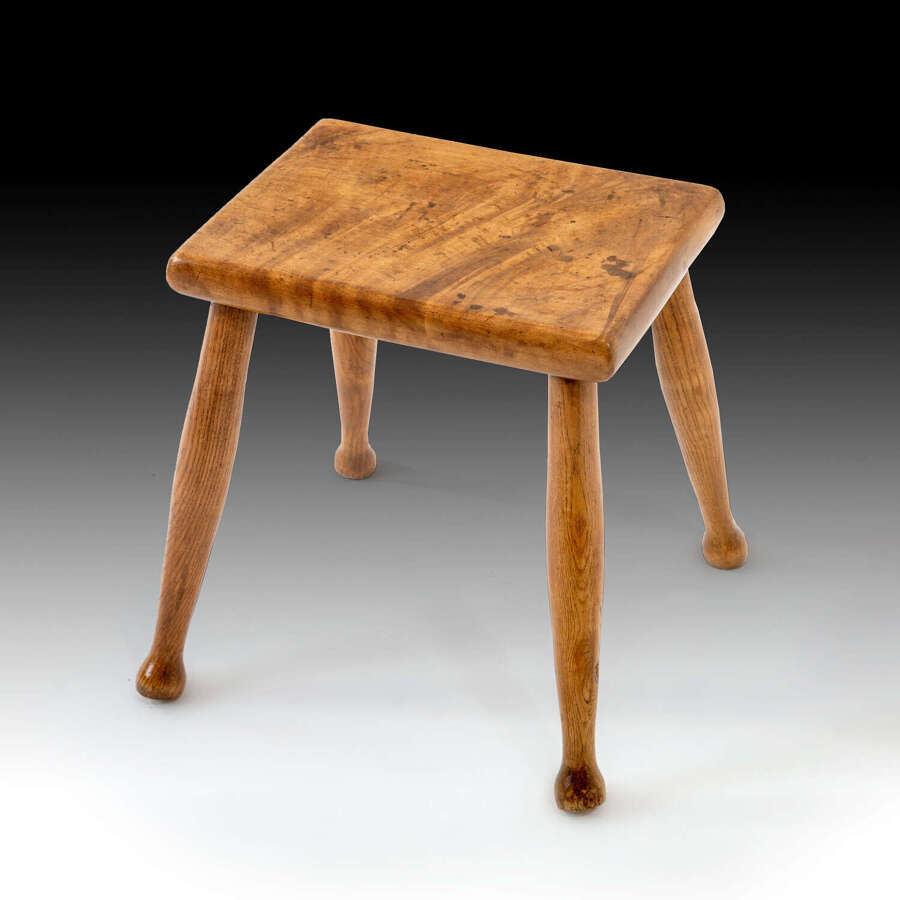 A small late 19th century Arts & Crafts stool