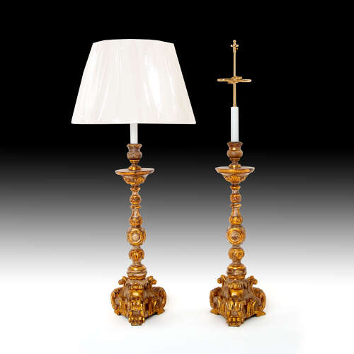 A pair of late 17th century giltwood candlesticks