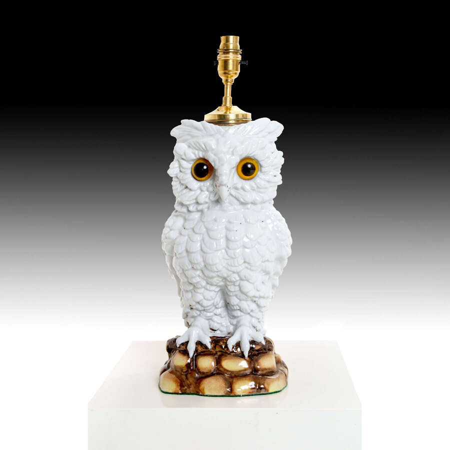 A 19th century ceramic owl lamp