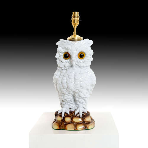A 19th century ceramic owl lamp